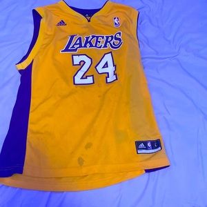 Kobe jersey Size youth large.Colors are gold and purple, and pre owned.